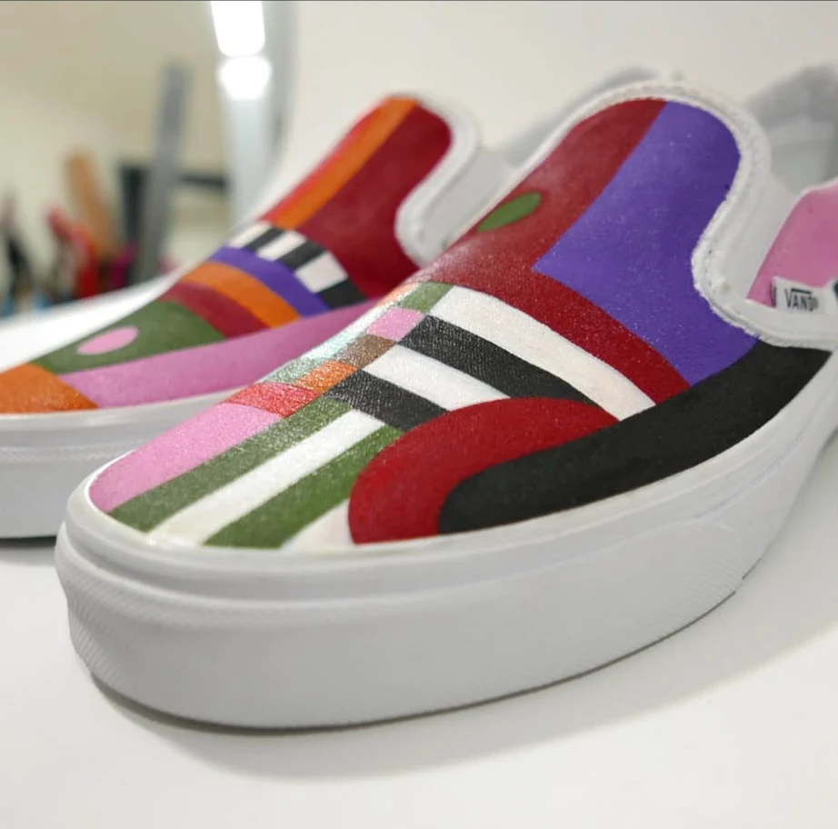 Hand-painted Vans slip-ons by Nico Beliko, geometric color blocks on white canvas